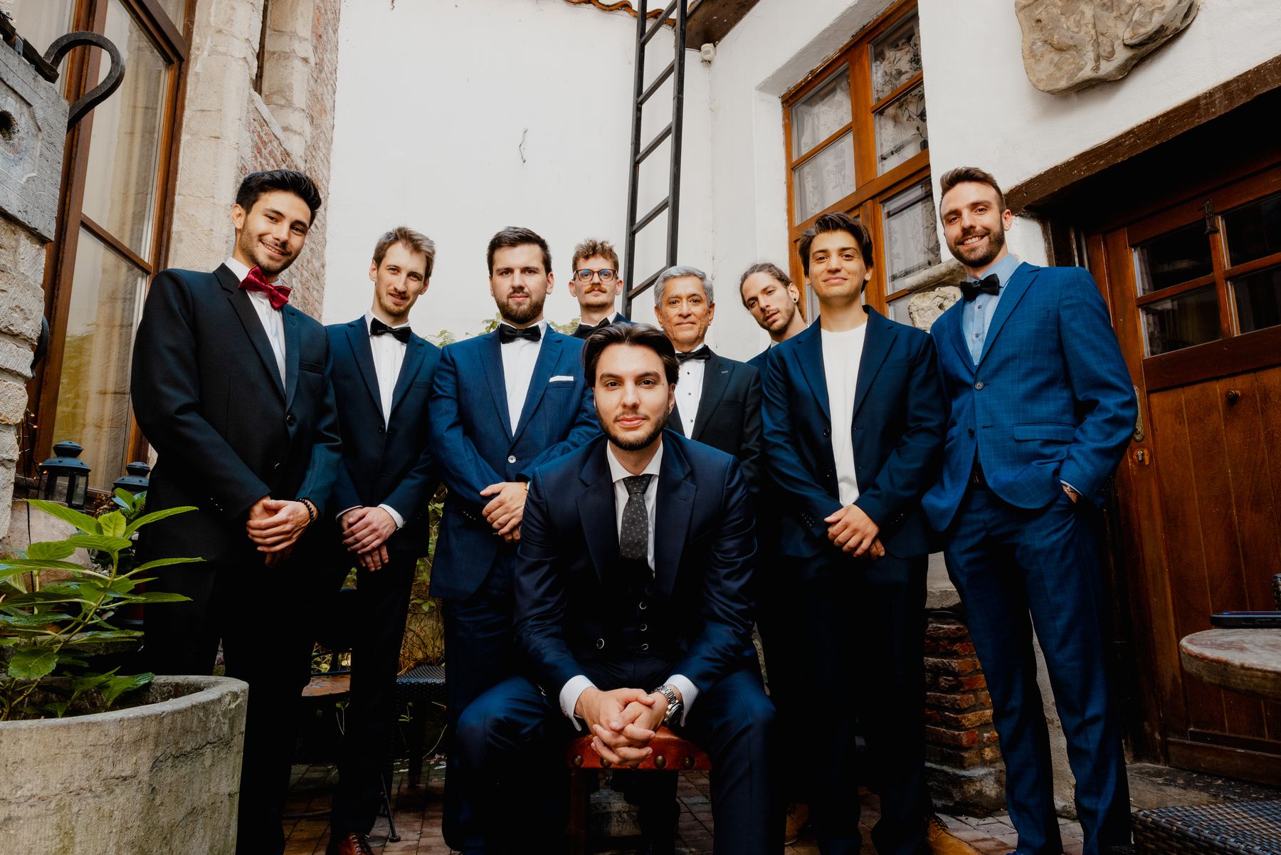 Groom with his groomsmen in blue suits